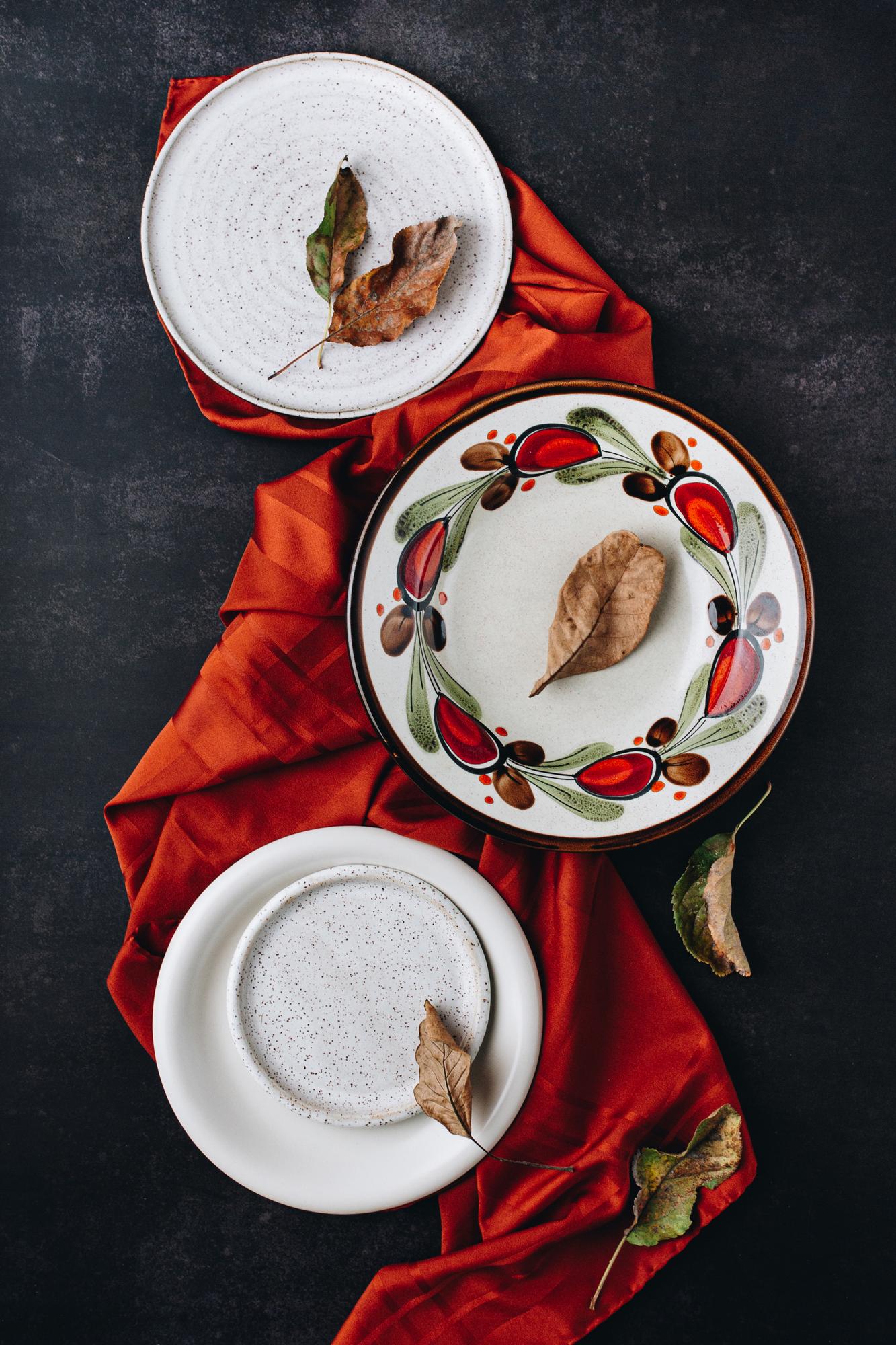 Large editorial shot of plated seasonal tasting menu