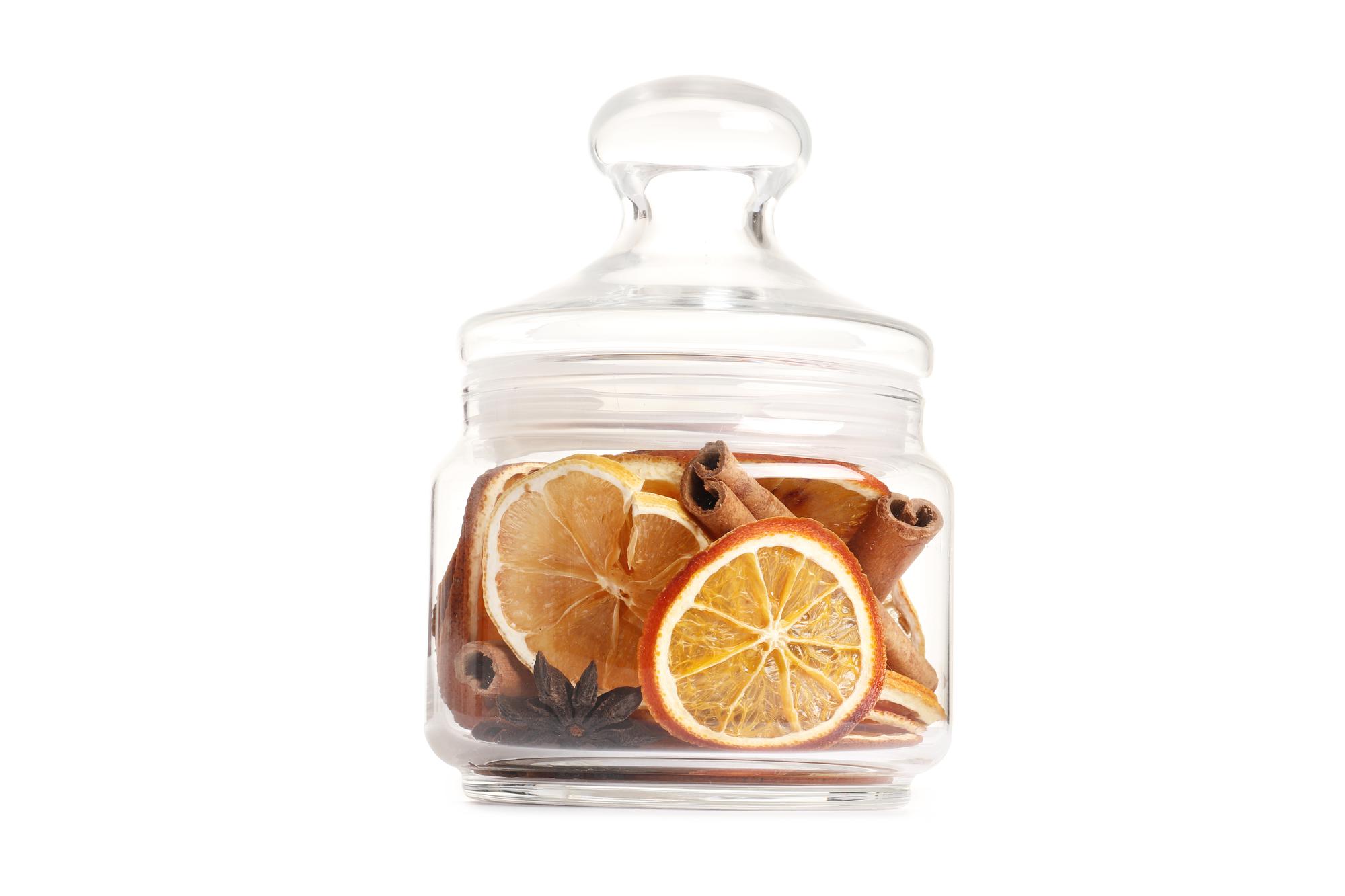 Smaller shot: jars of preserved citrus and herbs
